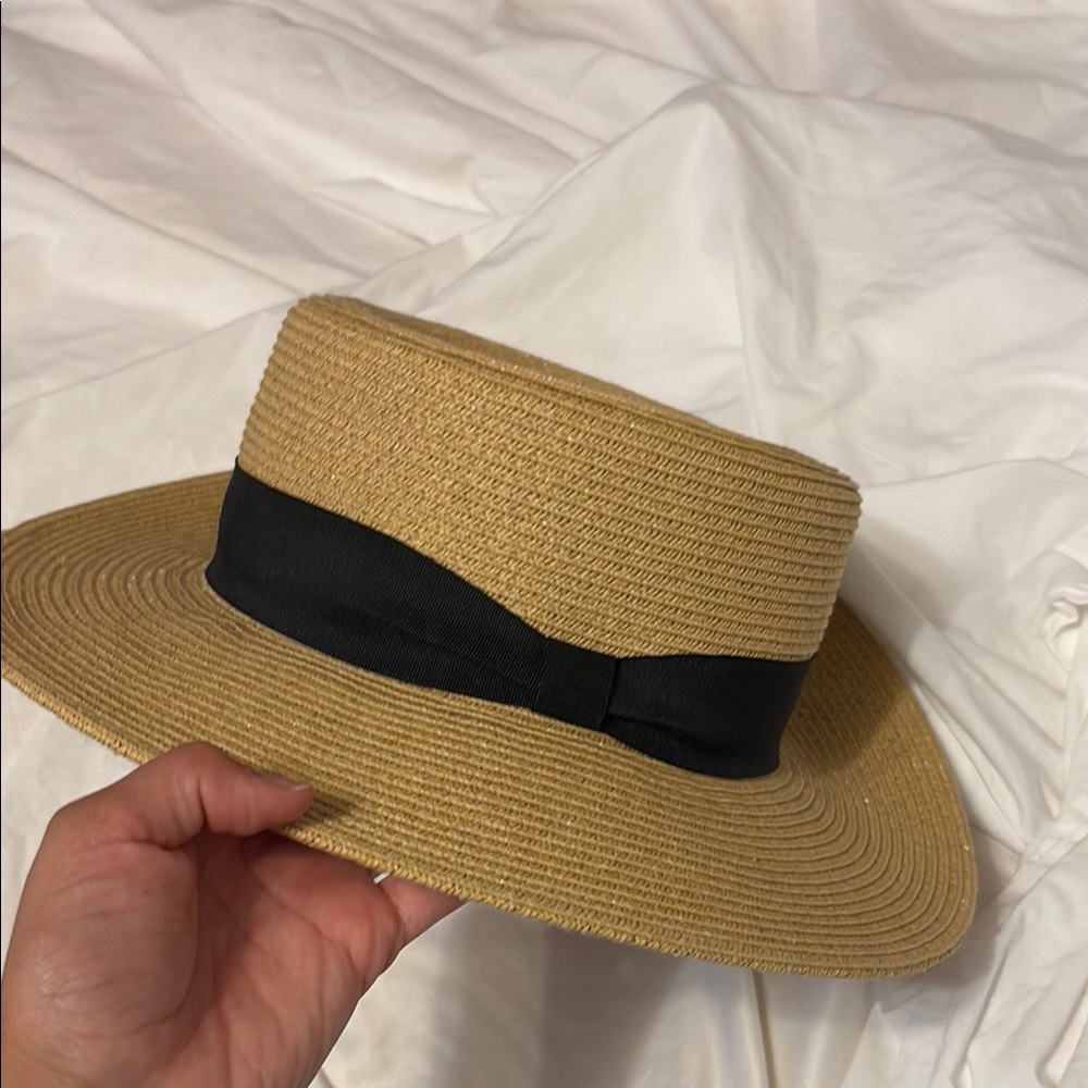 Elegant Tan Straw Hat with Black Band